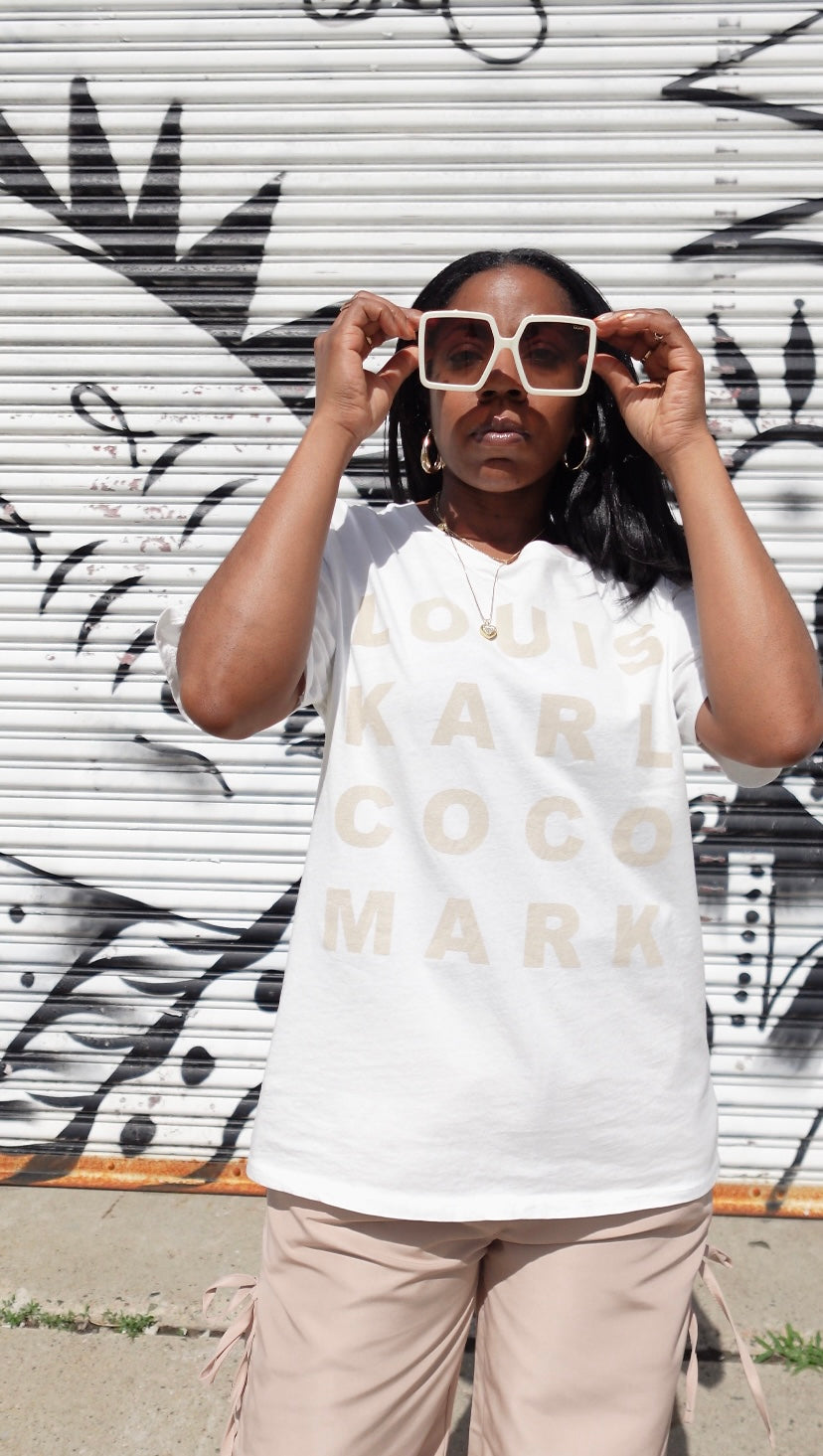 Creme T-shirt With famous Names Logos