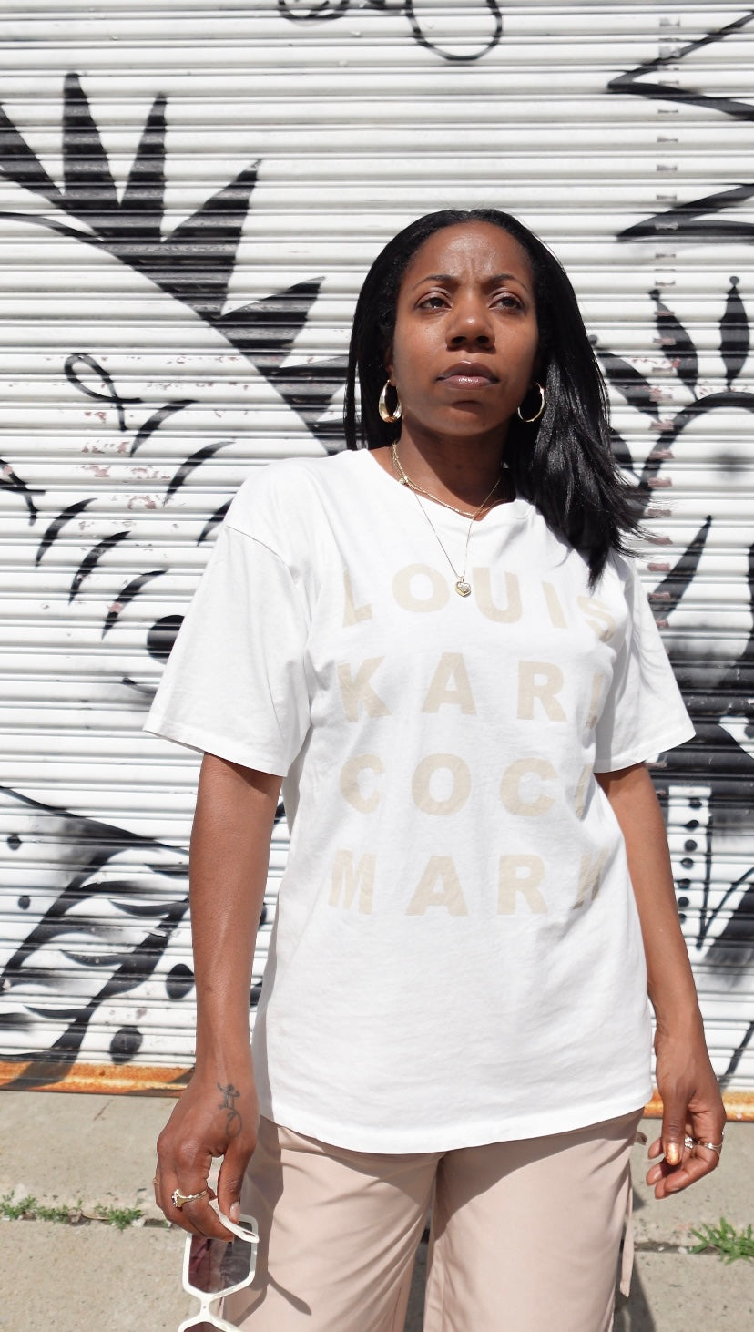 Creme T-shirt With famous Names Logos